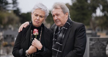 Funeral, graveyard and sad senior couple hug for comfort, empathy and support at memorial service....