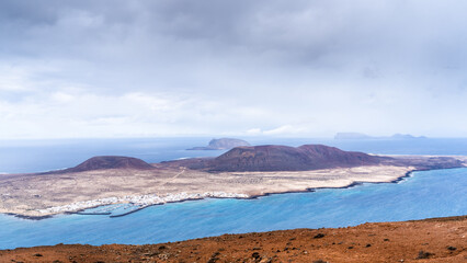 View over the beautiful Graciosa Island near Lanzarote. Canary, Macaronesia, Spain. - 722913501
