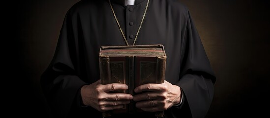 Hands of catholic priest reading a bible. Creative Banner. Copyspace image