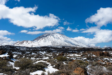 The beautiful pic Del Teide covered with snow and a beautiful desertic  foreground. Tenerife, Canary Islands, Spain. - 722918138