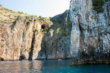 The steep and cavernous cliffs along Palinuro coastline, Salerno, Italy.