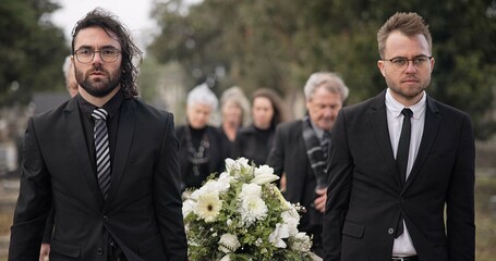 Pallbearers, men and walking with coffin at graveyard ceremony outdoor at burial place. Death,...