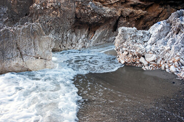 Small rocky cove at the bottom of the sea cliff.  