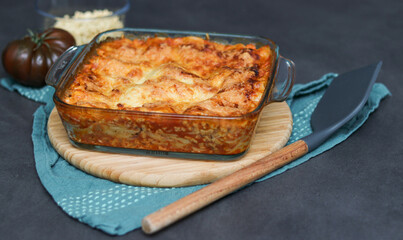 Close up of homemade vegan Lasagne with soy meat and vegan cheese in a baking dish