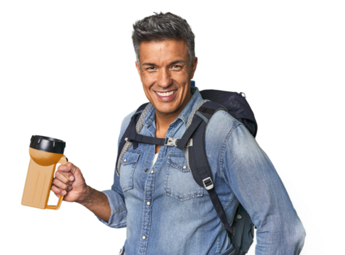 Hispanic trekker with backpack and flashlight showing a copy space on a palm and holding another hand on waist.