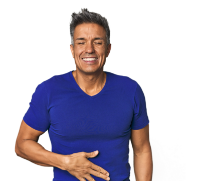 Middle-aged Latino man touches tummy, smiles gently, eating and satisfaction concept. - Powered by Adobe