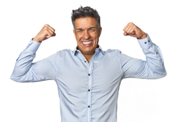 Middle-aged Latino man showing strength gesture with arms, symbol of feminine power