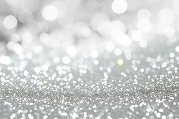 Silver glitter sparkles on a white background