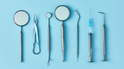Dental instruments on blue background