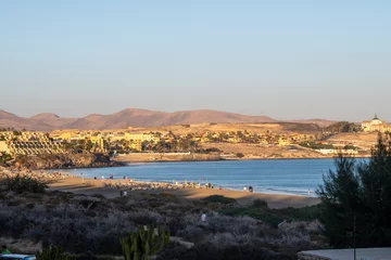 Photo sur Plexiglas Plage de Sotavento, Fuerteventura, Îles Canaries Aeriav view on sandy dunes, beach and Costa Calma, Fuerteventura, Canary islands, Spain in winter on sunset