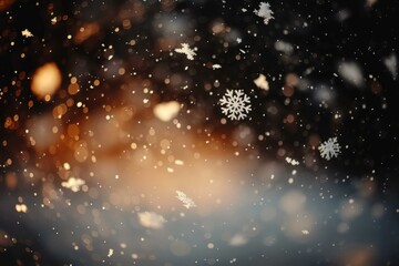 Obraz premium Blurred Image of Snowflakes Falling with a Warm Orange Background