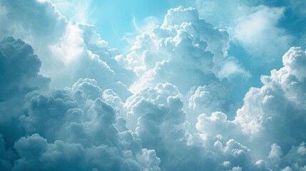Bright and fluffy white cloudscape with a few wispy clouds drifting in the foreground - obrazy, fototapety, plakaty