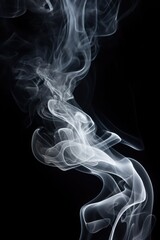 Fototapeta premium Close-up view of smoke on a black background. Can be used for creative projects or as a background image.