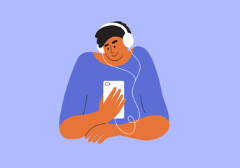 Obraz premium Man in headphones sitting holding smartphone in hand listening music, audiobook, podcast. Male character watching video by mobile phone, listening to online radio, audio book. Art vector illustration