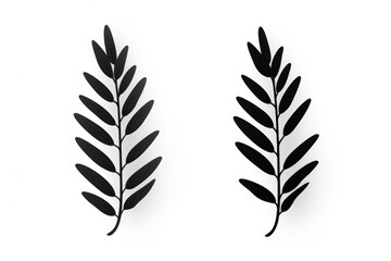 Two black leaves on a white background. Can be used for botanical or nature-themed designs
