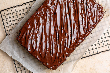 Chocolate moist buttermilk sheet cake with chocolate butter cream, homemade dessert on a cookig...
