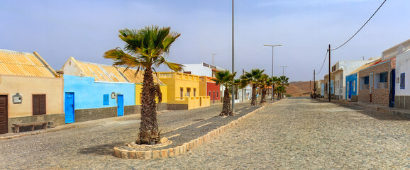 Vibrant town street : The painted houses of Sal Rei, Boa Vista island, Cape Verde. 