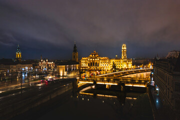 Luminous Tapestry: A Mesmerizing Night View of Oradea, Romania, From an Illuminated Bridge