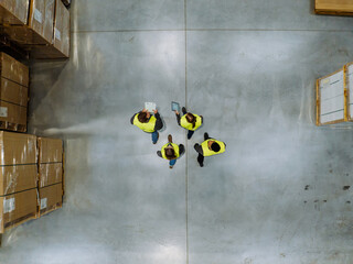 Top view of workers modern warehouse storage of retail shop, large factory workshop space....