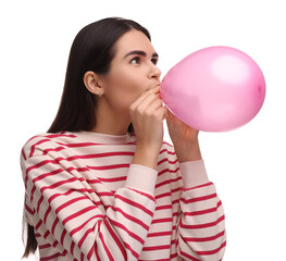 Woman inflating pink balloon on white background