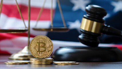 Cryptocurrency laws concept.bitcoin, Judge gavel and legal scales with flag of United States of...