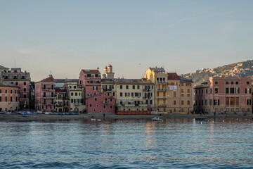 Fototapeta premium sestri levante silence bay view from the sea at sunset Baia del Silenzio sea harbor and beach view Liguria, Italy.