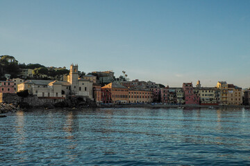 Fototapeta premium sestri levante silence bay view from the sea at sunset Baia del Silenzio sea harbor and beach view Liguria, Italy.
