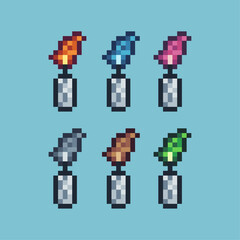 Fototapeta premium Pixel art sets icon of candle variation color.candle icon on pixelated style. 8bits perfect for game asset or design asset element for your game design. Simple pixel art icon asset.