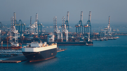 Roll on Roll off vehicle car carrier, New car lined up in the port for export to dealer around the...