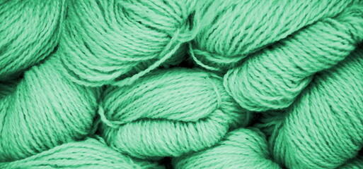 Knitting background and texture in green, handmade and hobby	
