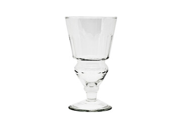 Empty absinthe or wine glass isolated on white background.