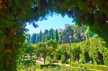 Gardens of Pedro Luis Alonso through the thuja arch, Malaga, Spain