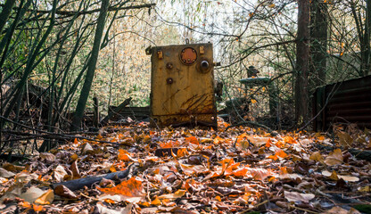 contaminated equipment dump in the Chernobyl forest