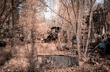 Fototapeta na wymiar contaminated radioactive technical landfill in the Chernobyl forest