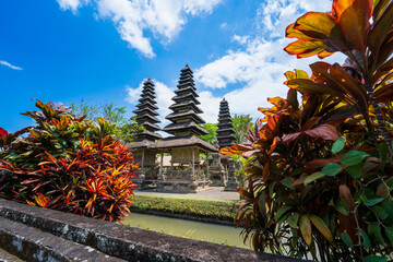 Pura Taman Ayun temple. In the middle of the day there was sunlight with a blue sky and clouds.