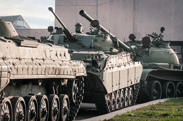 Fototapeta na wymiar military army equipment armored tank on a city street in Ukraine