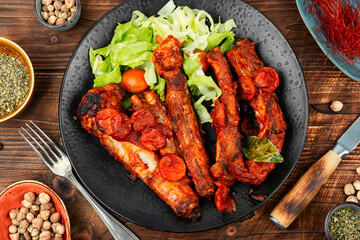 Stewed pork ribs in sauce.