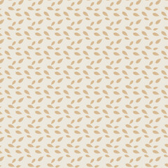 a beige pattern with leaves