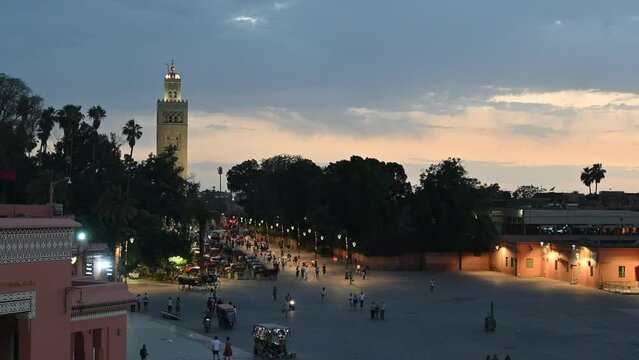 Jemaa el-Fnaa square in marrakech at evening with Koutoubia minaret 