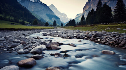 Fototapeta premium A watercourse surrounded by mountain.