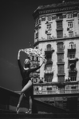 European Ballerina girl in city scene. Concept of ballet and dance