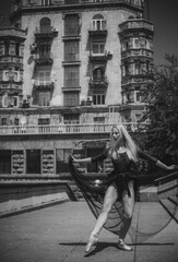 European Ballerina girl in city scene. Concept of ballet and dance