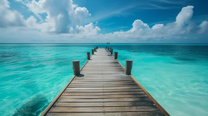 Foto op Plexiglas A wooden jetty at sea shore with cloudy sky and blue water. Beautiful summer landscape ,work life balance concept © AiDesign