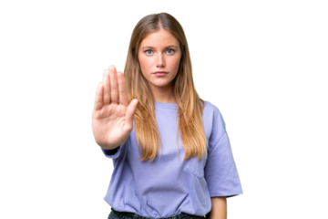 Young beautiful woman over isolated background making stop gesture