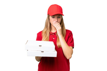 Young caucasian pizza delivery woman with work uniform picking up pizza boxes over isolated background having doubts