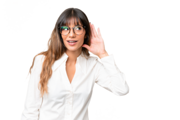 Young caucasian woman over isolated chroma key background listening to something by putting hand on the ear