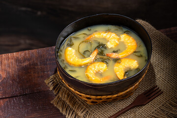 Tacacá, typical food from the Brazilian Amazon. Made with tucupi, jambu and shrimp.
