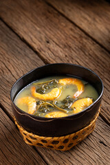 Tacacá, typical food from the Brazilian Amazon. Made with tucupi, jambu and shrimp.