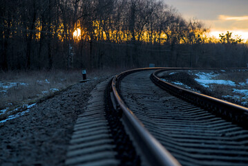 Photo of railroad and sunset in January