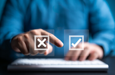 Businessman think and make choices between right and wrong symbols on blue background. Yes or No decisions, business options in difficult situations, crisis decision making. Decide to vote concept.